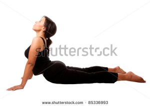 stock-photo-beautiful-attractive-woman-stretching-exercise-workout-cobra-yoga-position-dressed-in-black-85336993